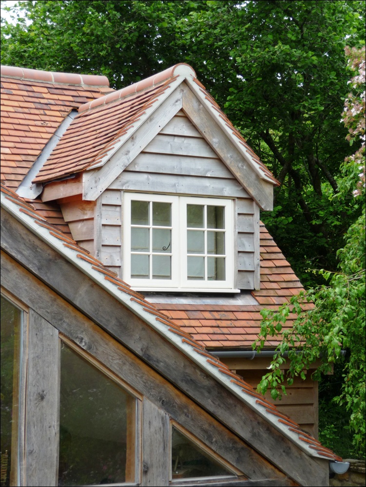 Cropped Hip roof with dormer window