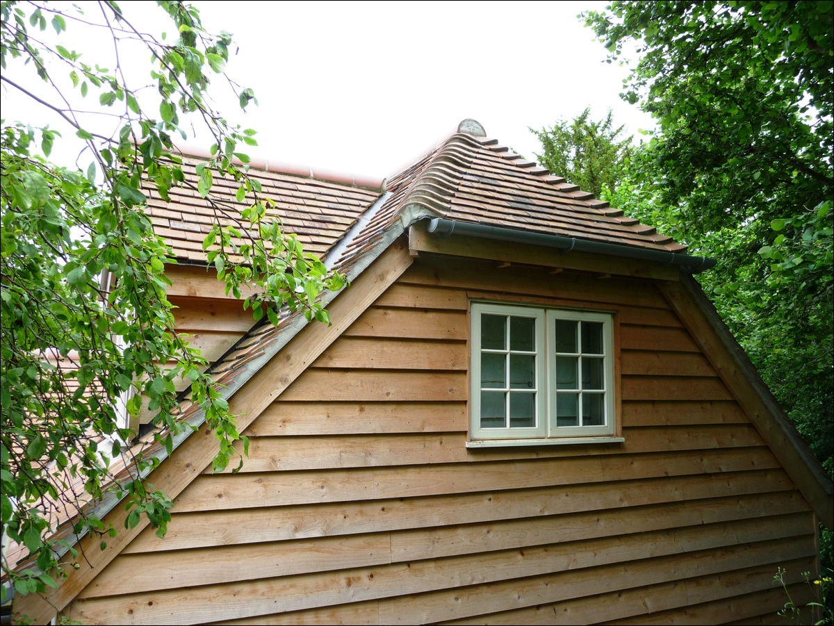 Cropped Hip roof with dormer window